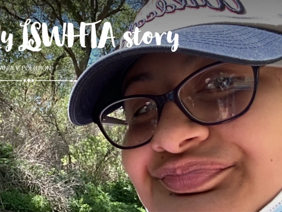 Close-up selfie of Nathania Politron outdoors in the shade, wearing a Wildcat hat and glasses, with overlay text: "My LSWHTA story.