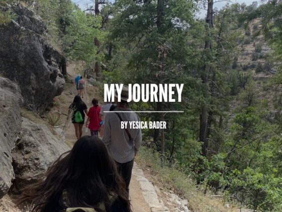Group of students hiking a forest trail surrounded by pine trees and rocky terrain. Text reads "My Journey" by Yesica Bader.