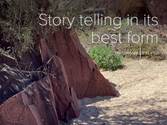 Petroglyph-covered red rock slabs in the desert with the overlaid text "Story telling in its best form" by Emmanuel Lopez.